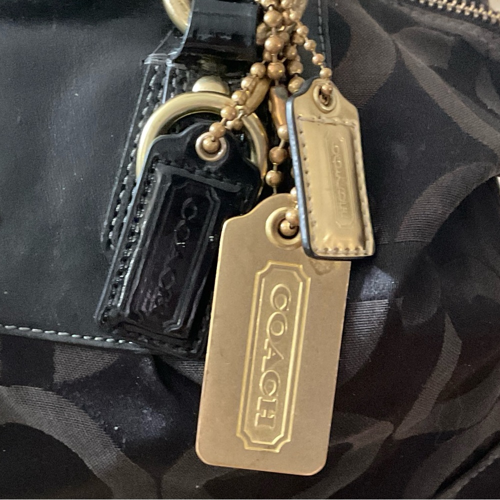 Coach Madison's black satchel has three tags and is in EUC - Picture 2 of 13